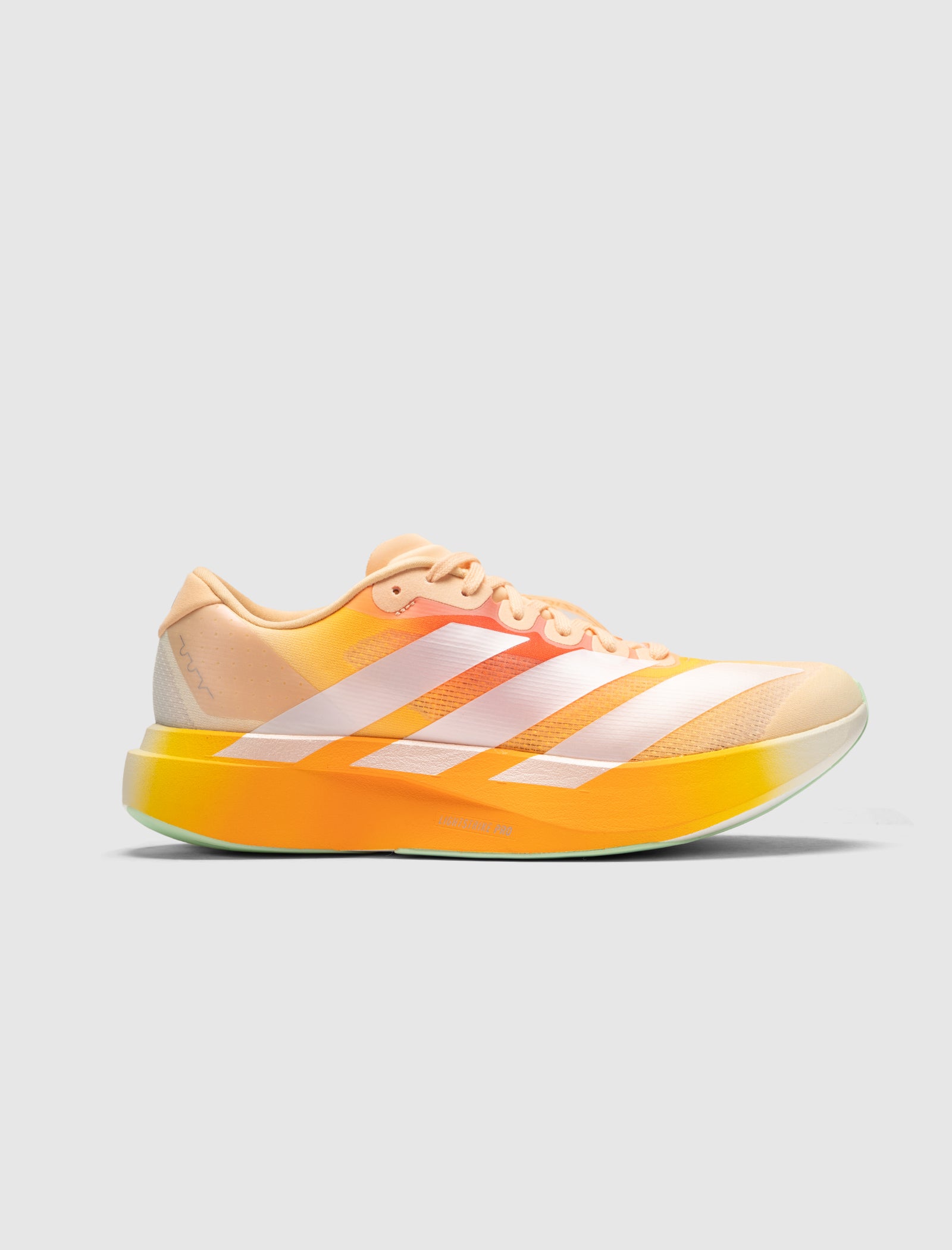 The DO NOT DUPLICATE EVO SL DAYGLOW "ORANGE/WHITE" is a lightweight mesh running sneaker in peach and yellow with white stripes, a gradient sole, and responsive Lightstrike Pro foam, shown on a plain gray background.