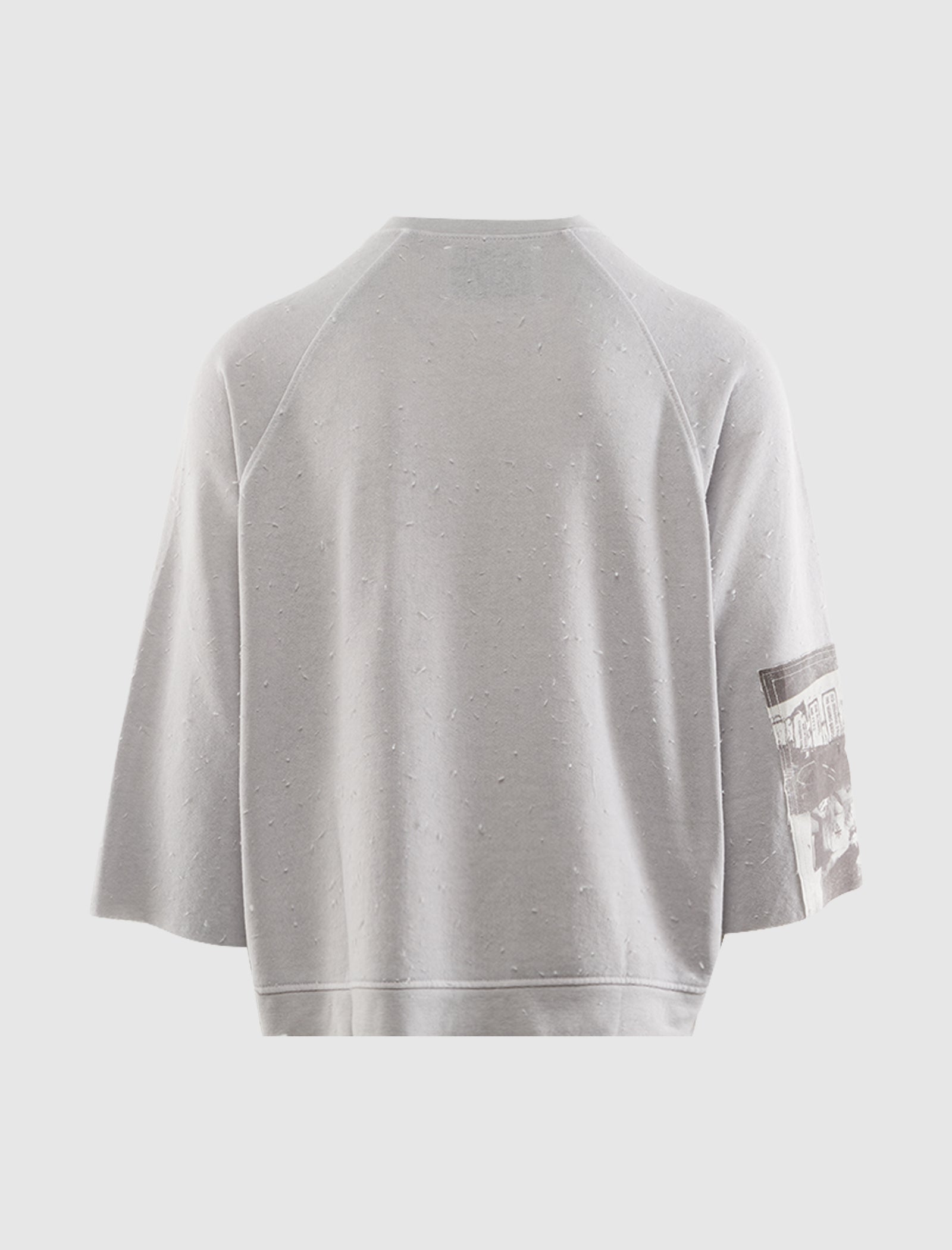 LOVE NEEDS CARE CREWNECK