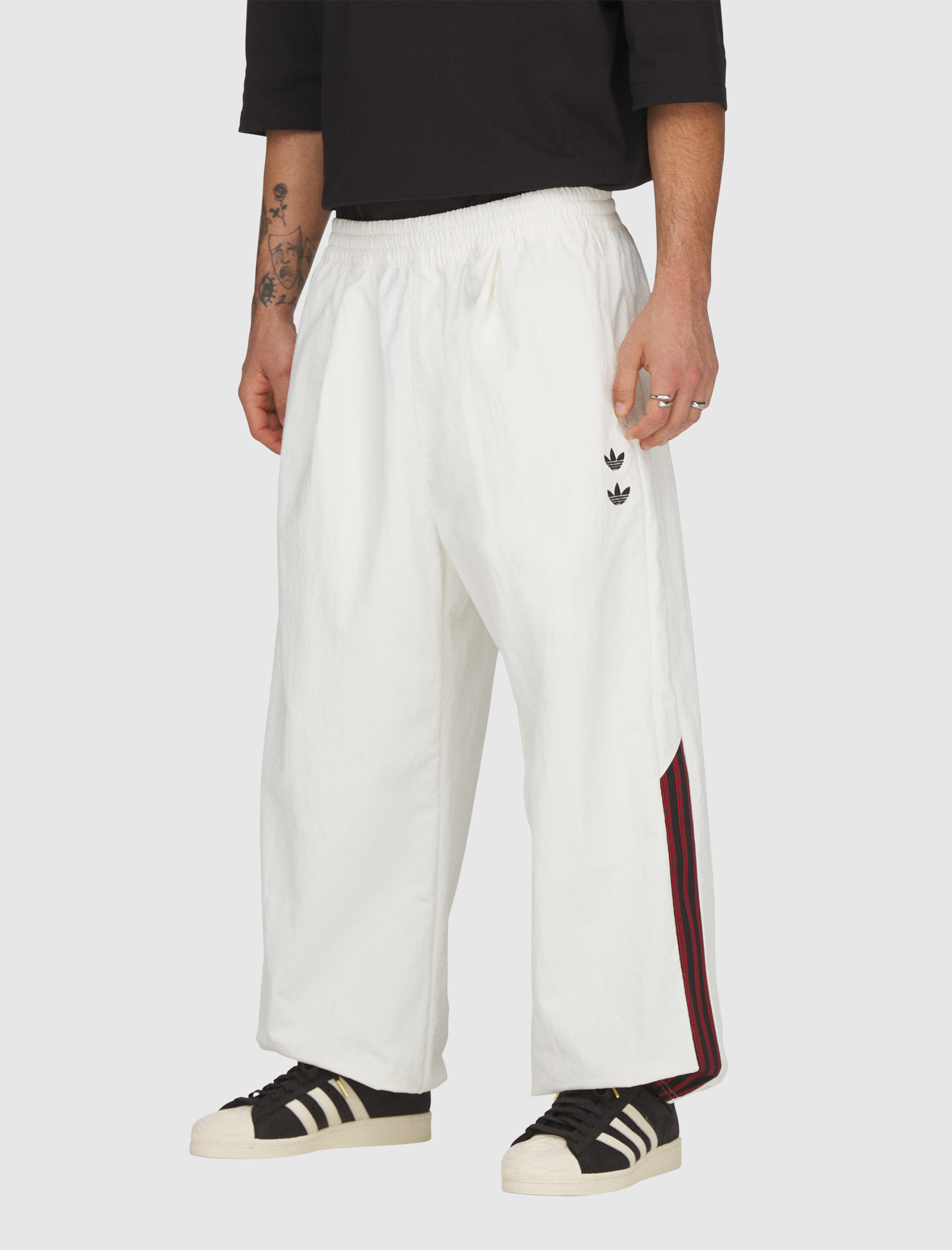 ウォーキング・ランニングウェア WOVEN TRACK PANTS /adidasWILLY CHAVARRIA ADIDAS X WILLY CHAVARRIA WOVEN TRACK PANTS
